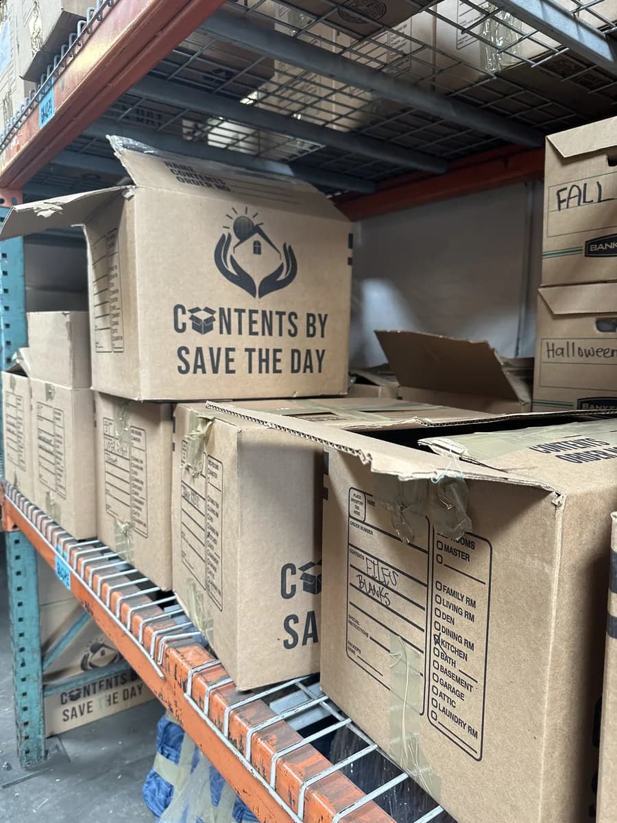 Branded Contents by Save The Day inventory boxes stored on warehouse racks