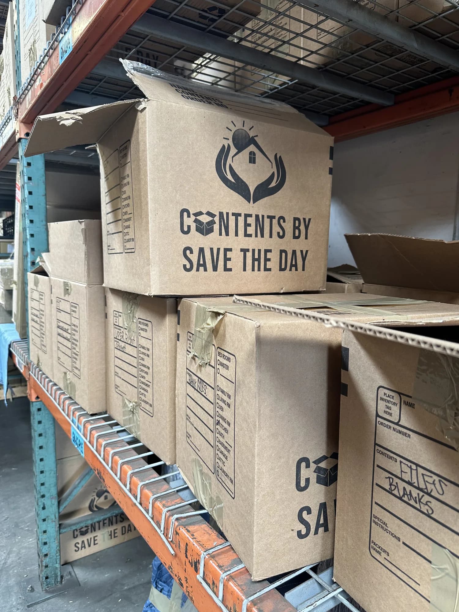 Branded Contents by Save The Day inventory boxes stored on climate-controlled warehouse racks